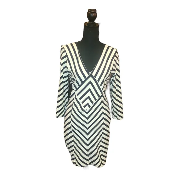 bebe black and white striped dress Minnie Textured Baby Doll Dress in Black main image 0